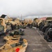 Marines with 5th Marine Regiment prepare vehicles for inspection