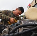 Marines with 5th Marine Regiment prepare vehicles for inspection