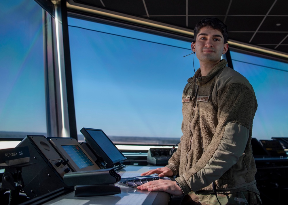 Air Traffic Control Airmen monitor, communicate with aircraft