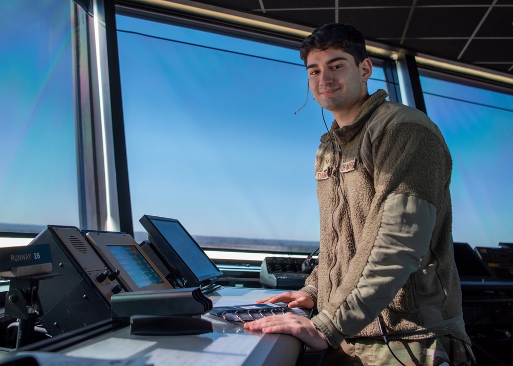 Air Traffic Control Airmen monitor, communicate with aircraft