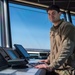 Air Traffic Control Airmen monitor, communicate with aircraft