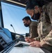 Air Traffic Control Airmen monitor, communicate with aircraft