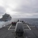 Ship pulls alongside for underway replenishment