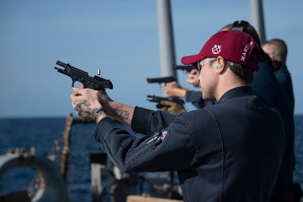 Sailor fires M9 Pistol