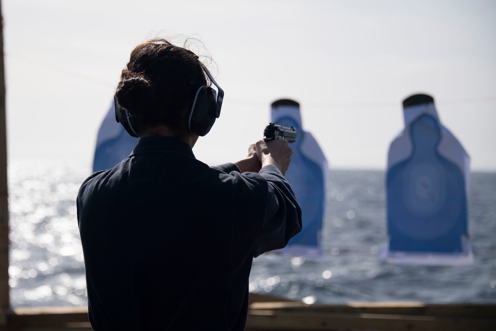 Sailor fires M9 Pistol