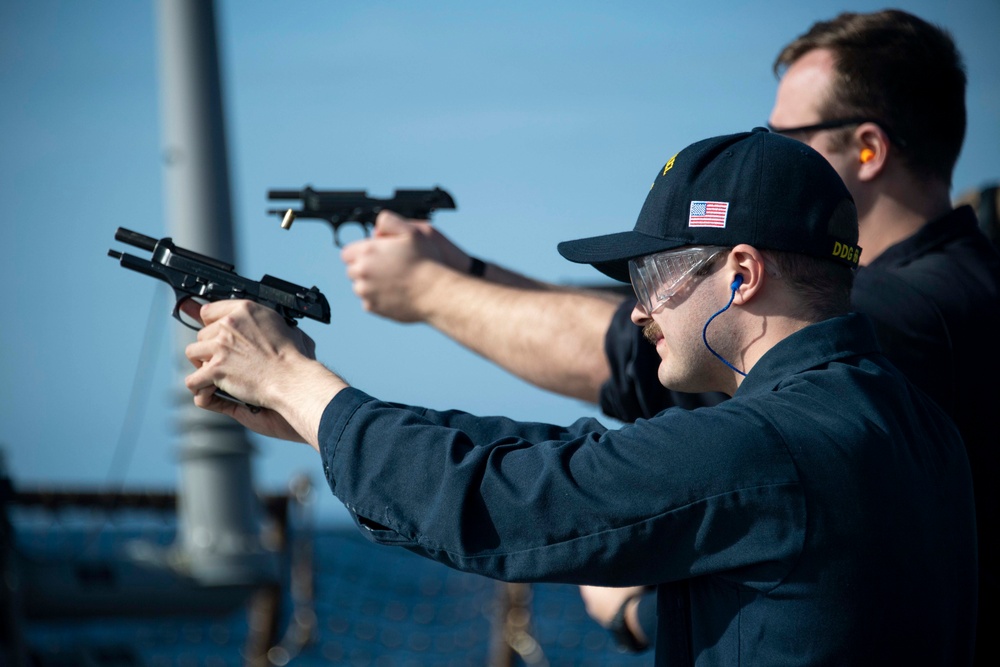 Sailor fires M9 Pistol