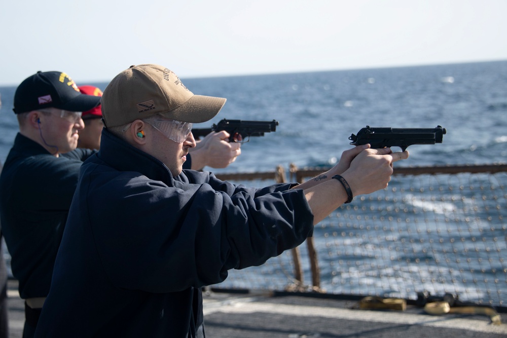 Sailor fires M9 Pistol