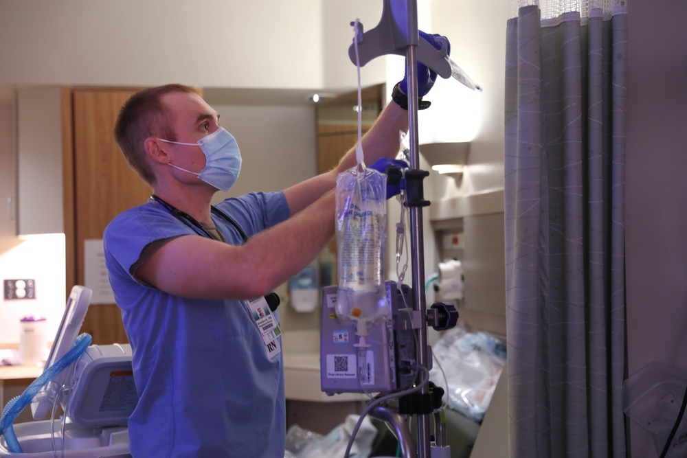 U.S. Air Force nurse providing patient care