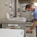 U.S. Air Force nurse retrieves patients' medicine