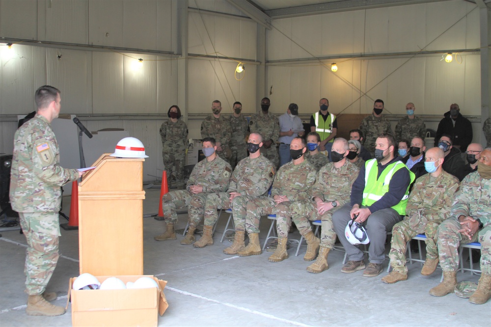 Col. Travis Rayfield addresses assembled group at groundbreaking at Whiteman AFB