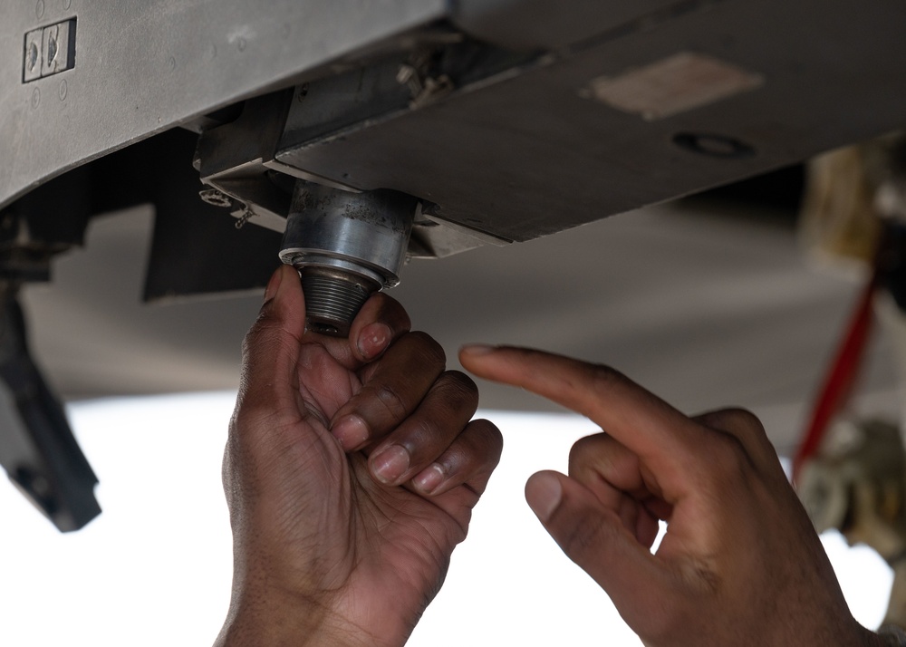 Weapons airmen conduct routine maintenance