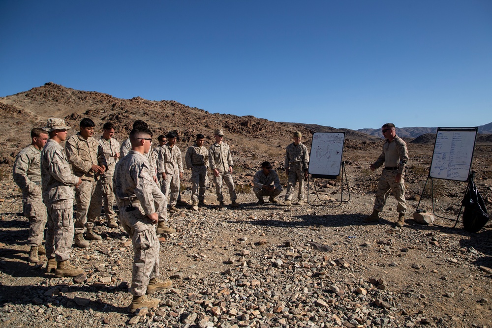 Marine Raiders and UAE Presidential Guard execute live fire training at the Combat Center