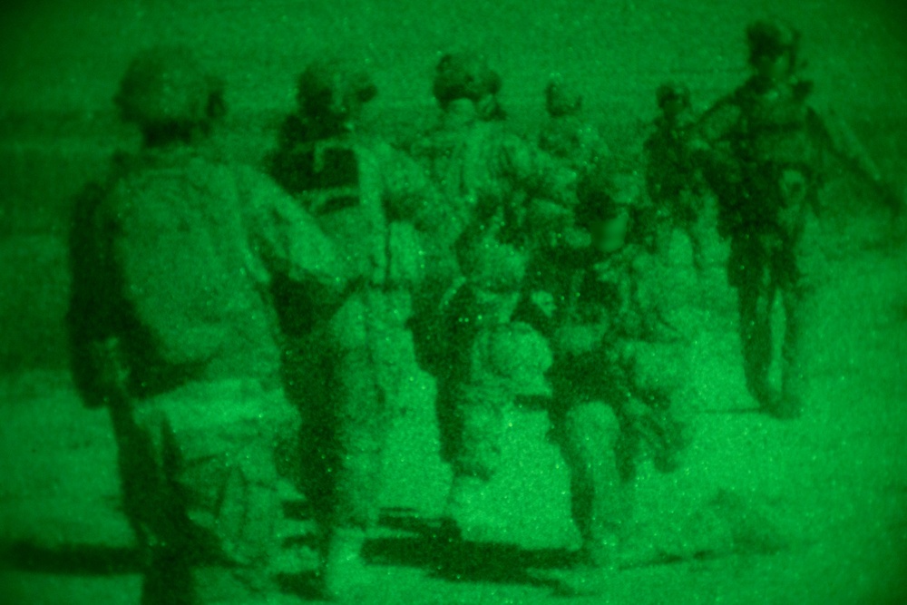 Marine Raiders and UAE Presidential Guard execute night raid training exercise at the Combat Center