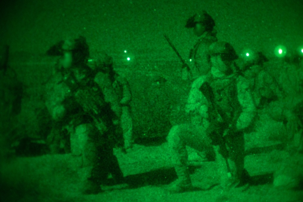 Marine Raiders and UAE Presidential Guard execute night raid training exercise at the Combat Center