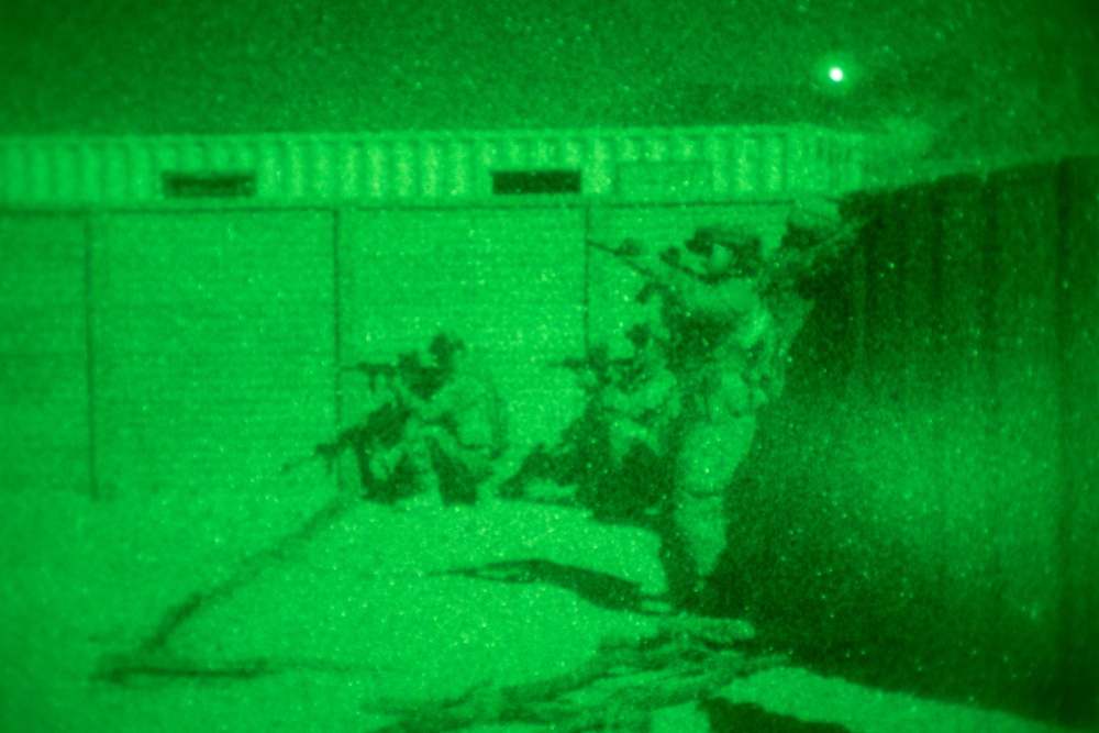 Marine Raiders and UAE Presidential Guard execute night raid training exercise at the Combat Center