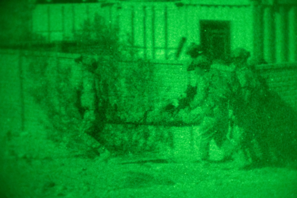 Marine Raiders and UAE Presidential Guard execute night raid training exercise at the Combat Center