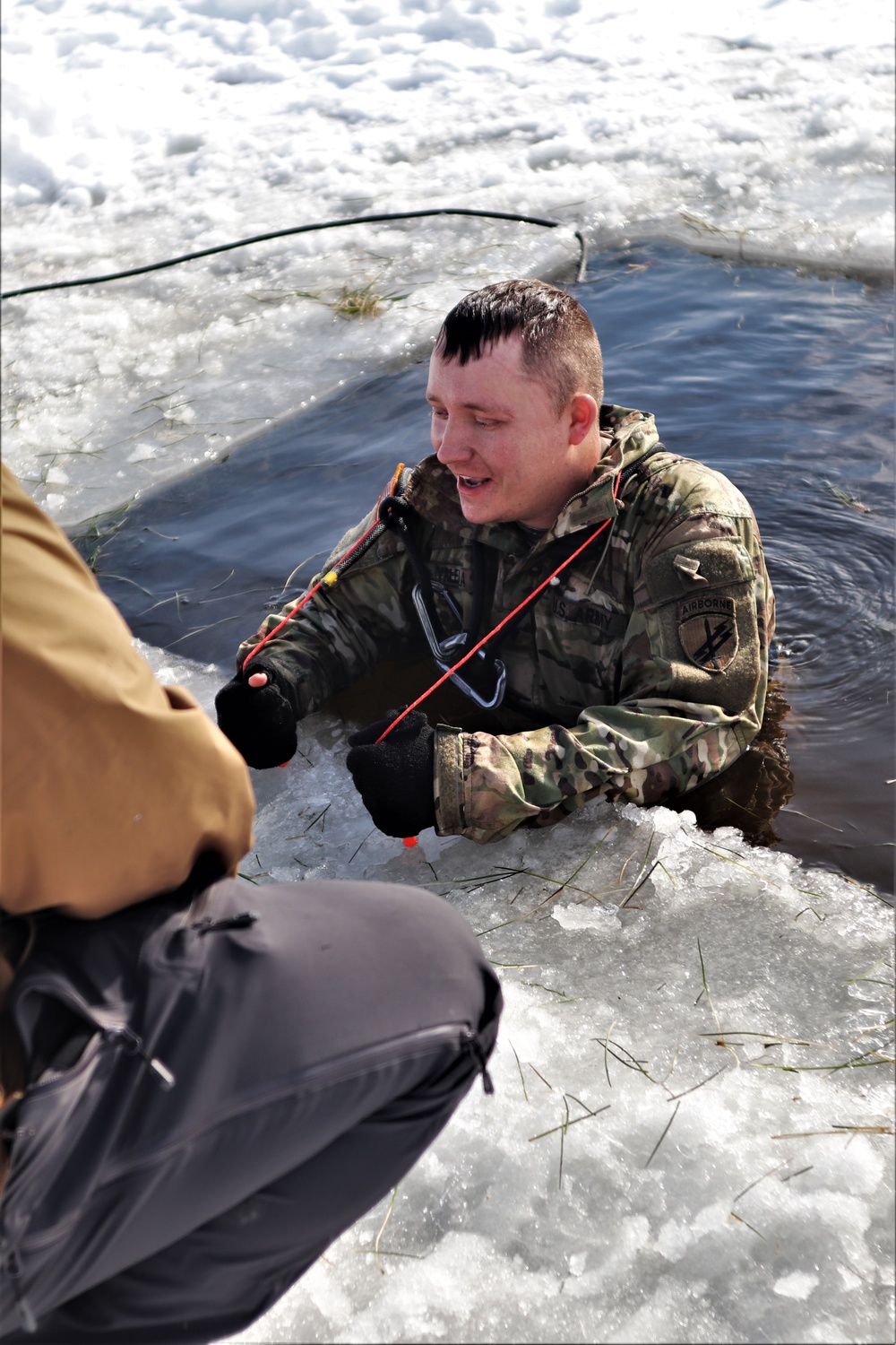 CWOC class 22-03 students jump in for cold-water immersion training