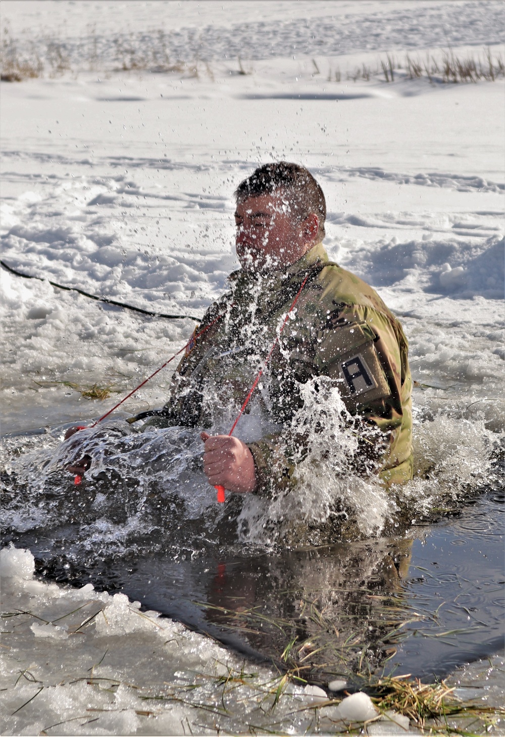 CWOC class 22-03 students jump in for cold-water immersion training