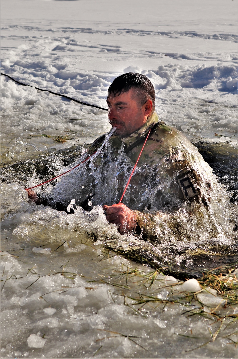 CWOC class 22-03 students jump in for cold-water immersion training