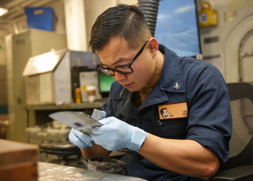 Abraham Lincoln Sailors conduct maintenance