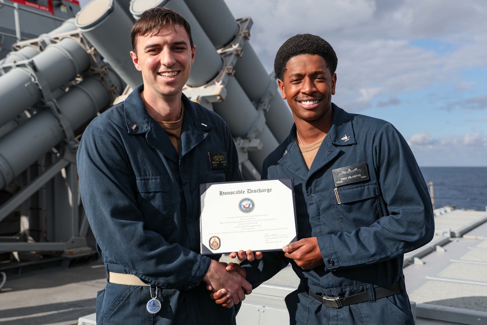 USS Ross Sailor reenlists