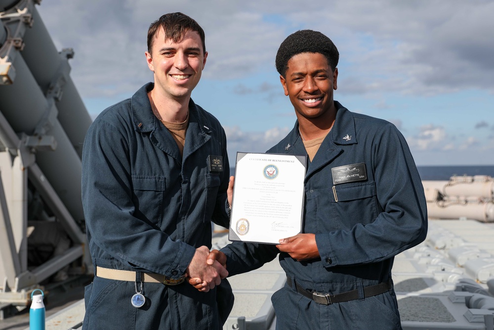 USS Ross Sailor reenlists