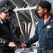 USS Ross Sailor reenlists