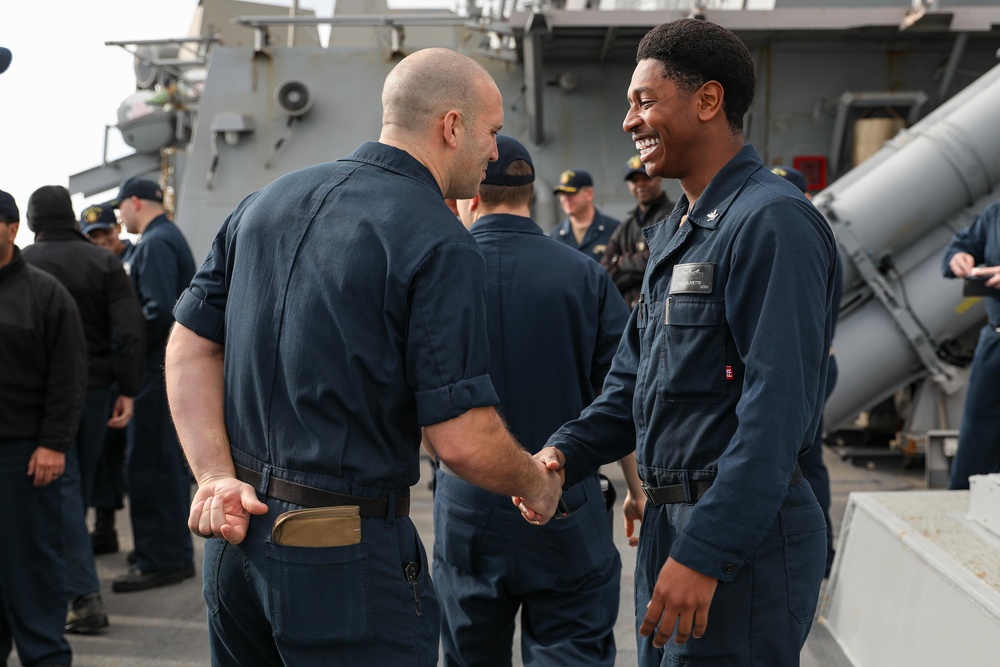 USS Ross Sailor reenlists