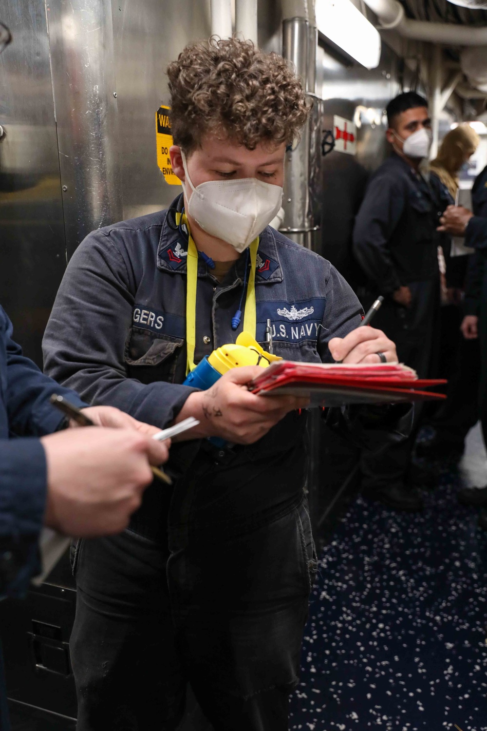 USS Ross Sailors hold main space fire drill