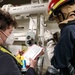 USS Ross Sailors hold main space fire drill