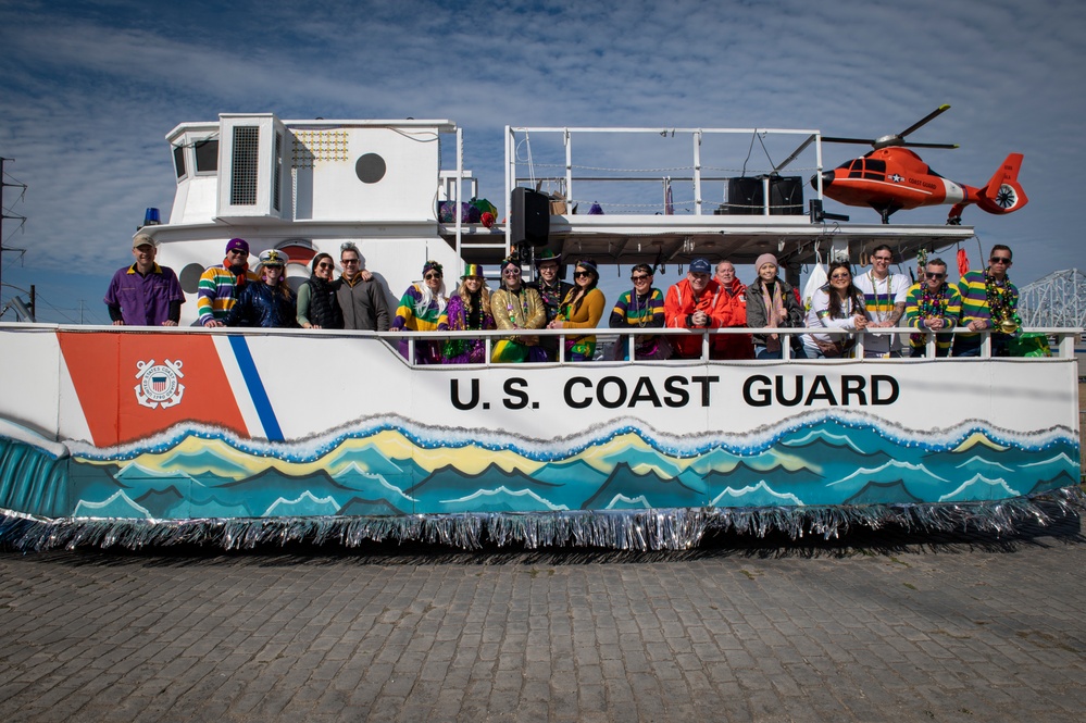 Coast Guard District Eight personnel participates in the Krewe of Alla Mardi Gras parade