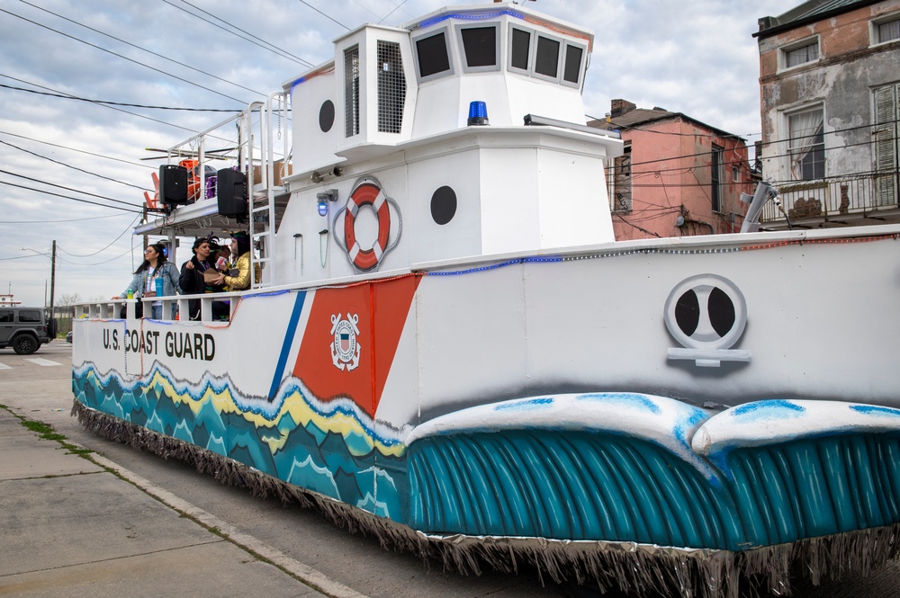 Coast Guard District Eight personnel participates in the Krewe of Alla Mardi Gras parade