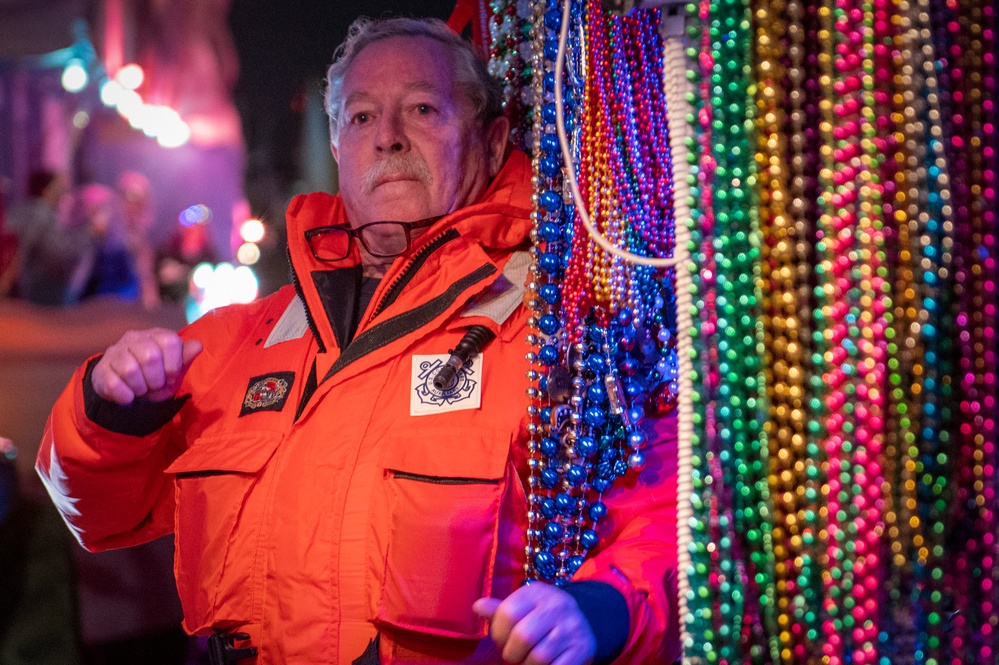 Coast Guard District Eight personnel participates in the Krewe of Alla Mardi Gras parade