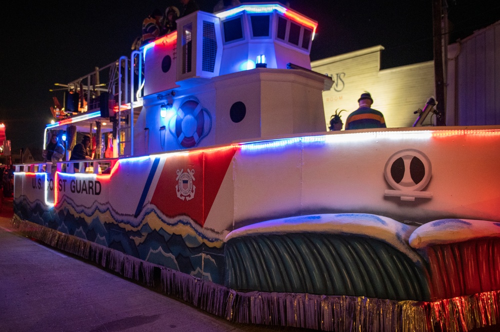 Coast Guard District Eight personnel participates in the Krewe of Alla Mardi Gras parade