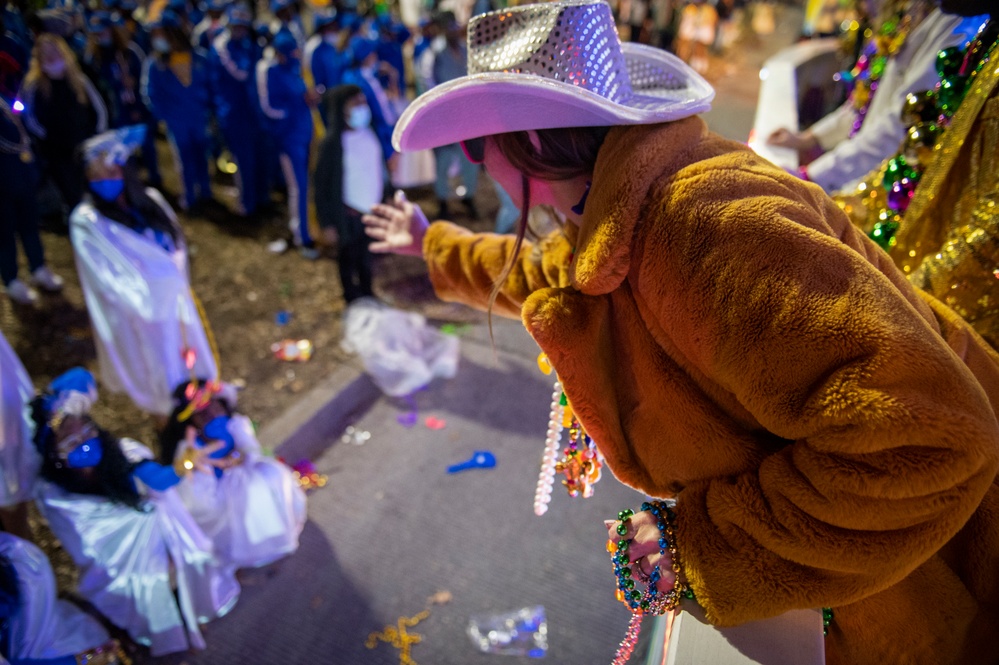 Coast Guard District Eight personnel participates in the Krewe of Alla Mardi Gras parade