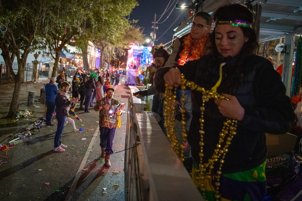 Coast Guard District Eight personnel participates in the Krewe of Alla Mardi Gras parade