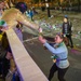 Coast Guard District Eight personnel participates in the Krewe of Alla Mardi Gras parade