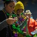 Coast Guard District Eight personnel participates in the Krewe of Alla Mardi Gras parade