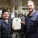 USS Ross Sailor reenlists