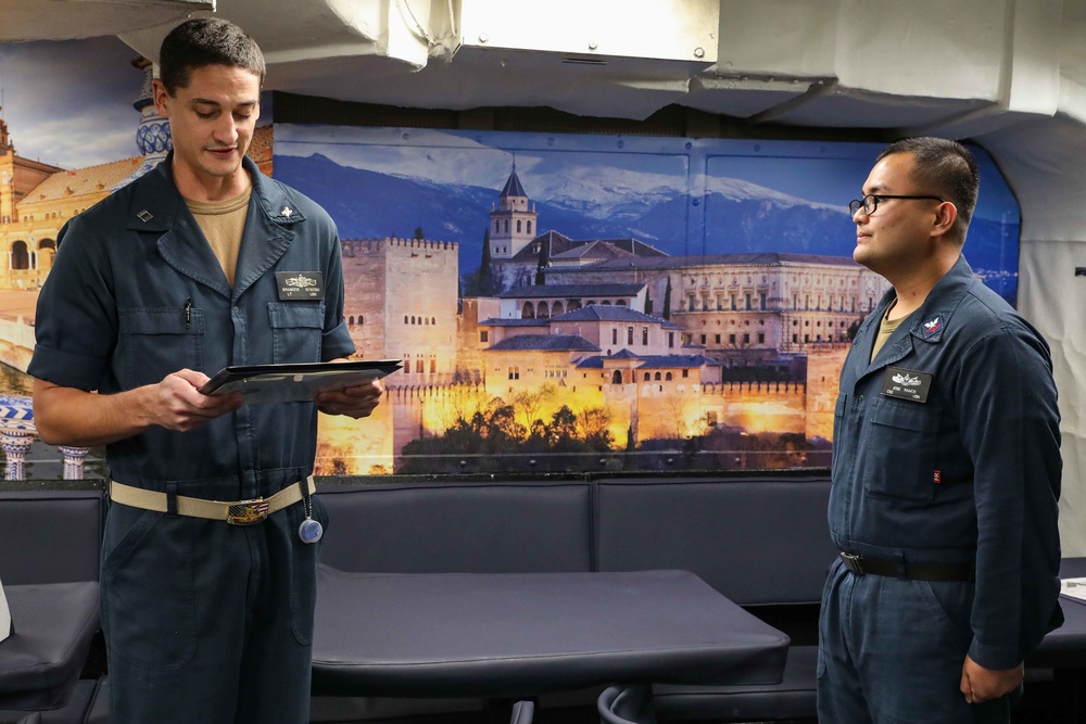 USS Ross Sailor reenlists