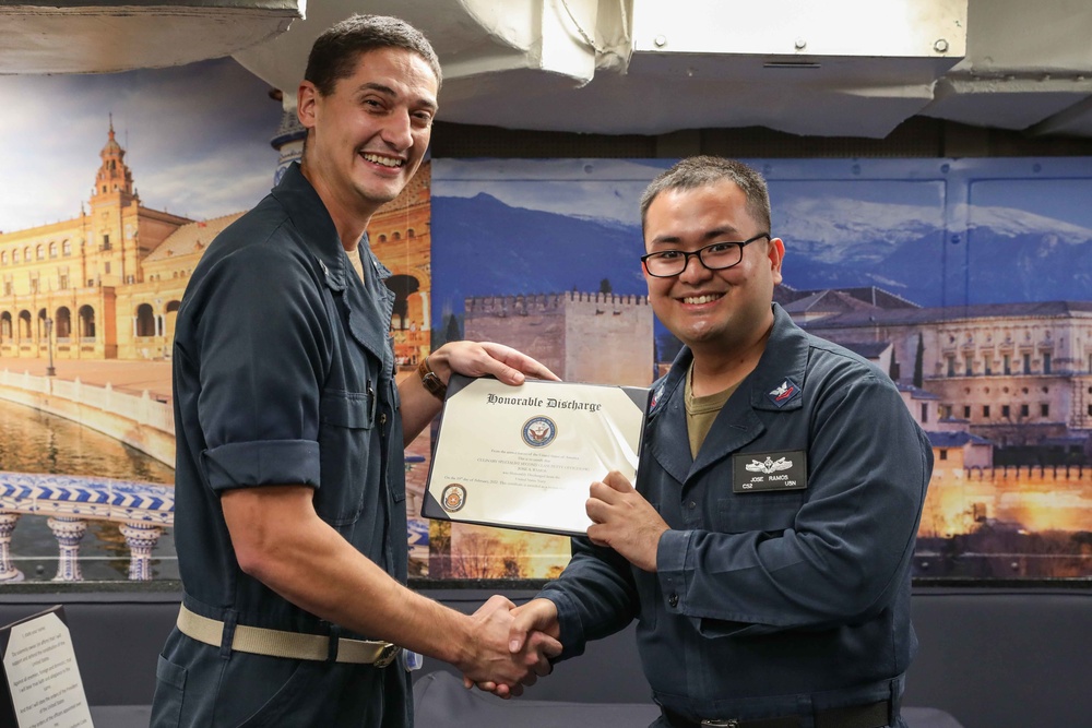 USS Ross Sailor reenlists