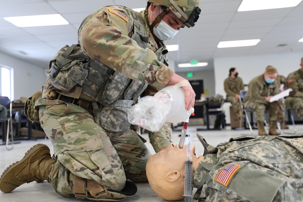 Michigan National Guard Soldiers perform TC 8-800 MEDIC certification