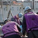 USS Ross replenishes at sea with USNS Robert E. Peary