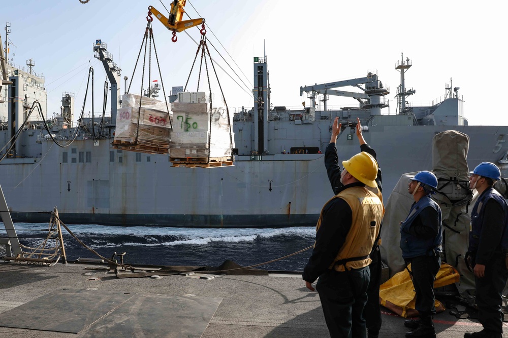 USS Ross replenishes at sea with USNS Robert E. Peary