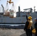 USS Ross replenishes at sea with USNS Robert E. Peary