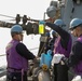 USS Ross replenishes at sea with USNS Robert E. Peary