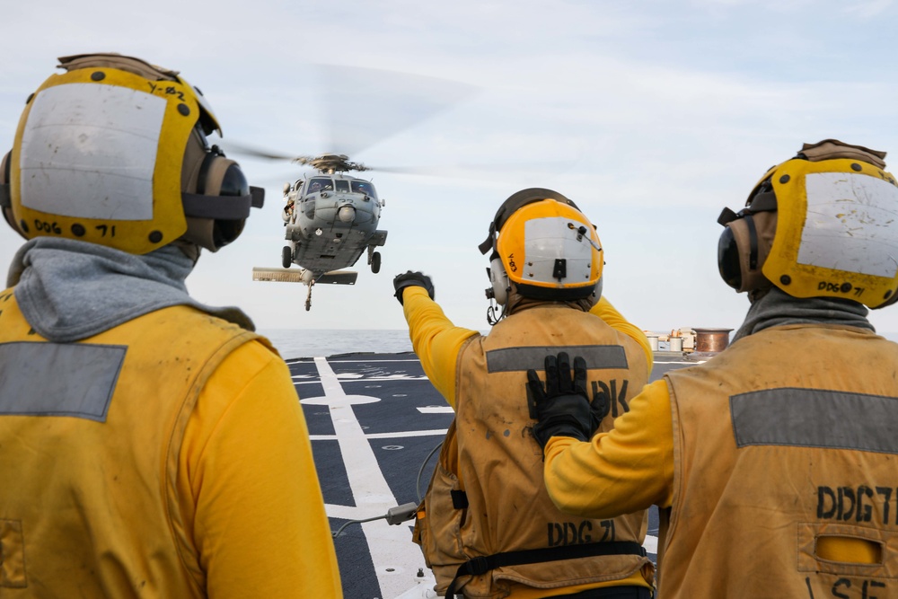 USS Ross conducts flight operations with Knighthawk helicopter