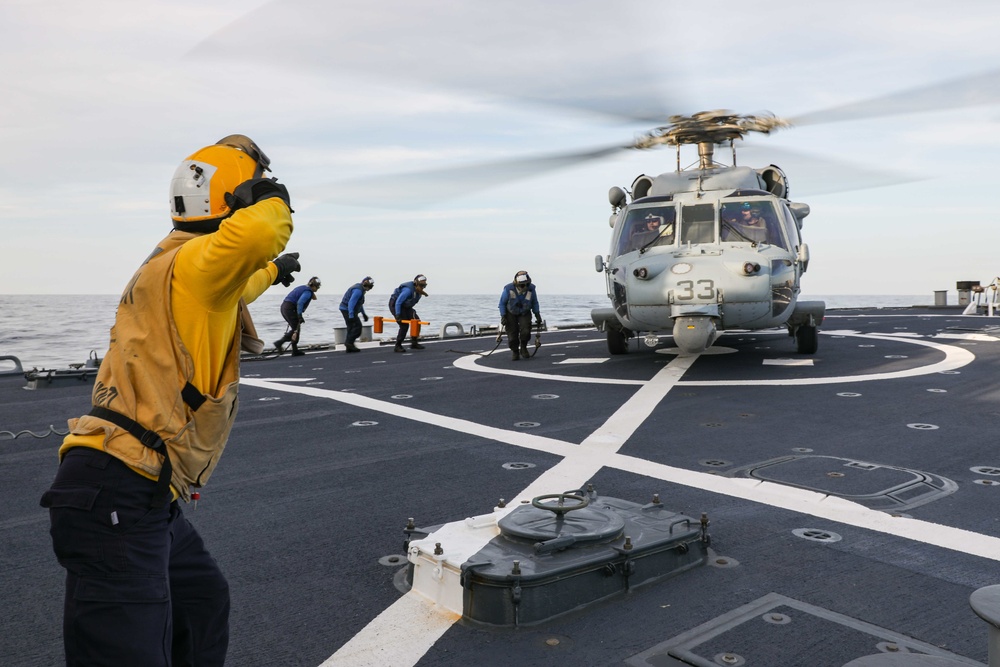 USS Ross conducts flight operations with Knighthawk helicopter
