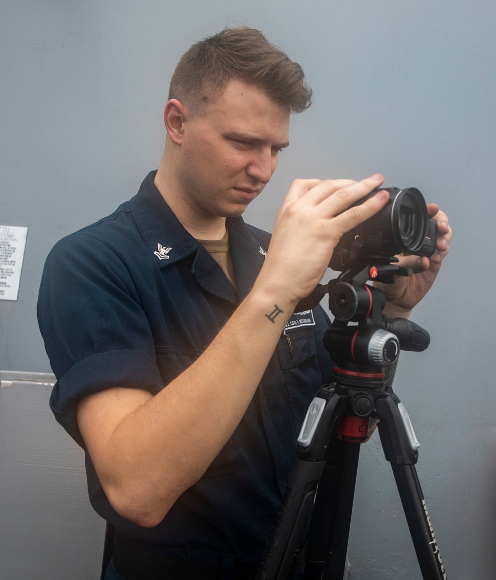 Sailors Aboard USS Ralph Johnson Conduct Visual Information Training