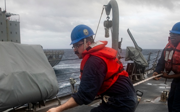Sailors Aboard USS Ralph Johnson Conduct Replenishment-at-Sea with USNS Guadalupe (T-AO-200)